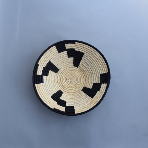 Hand woven straw. A tradition and art which has been part of Ugandan culture for centuries.  With all of the materials used being natural products or recycled, we also believe this is a lovely way of making use of natural resources the world has to offer and making positive changes to become more sustainable.  Beautifully, unique, handmade basket made out of banana stalks and raffia fibres also known as the Ugandan basket.