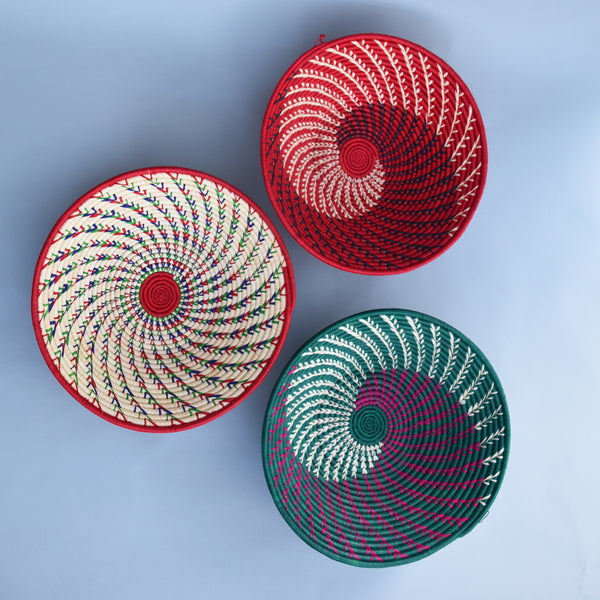 Hand woven straw. A tradition and art which has been part of Ugandan culture for centuries.  With all of the materials used being natural products or recycled, we also believe this is a lovely way of making use of natural resources the world has to offer and making positive changes to become more sustainable.  Beautifully, unique, handmade basket made out of banana stalks and raffia fibres also known as the Ugandan basket.
