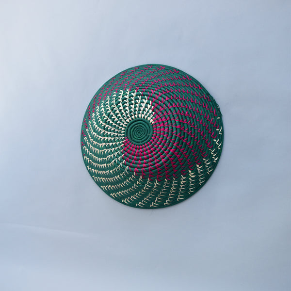 Hand woven straw. A tradition and art which has been part of Ugandan culture for centuries.  With all of the materials used being natural products or recycled, we also believe this is a lovely way of making use of natural resources the world has to offer and making positive changes to become more sustainable.  Beautifully, unique, handmade basket made out of banana stalks and raffia fibres also known as the Ugandan basket.