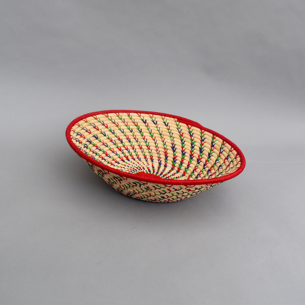 Hand woven straw. A tradition and art which has been part of Ugandan culture for centuries.  With all of the materials used being natural products or recycled, we also believe this is a lovely way of making use of natural resources the world has to offer and making positive changes to become more sustainable.  Beautifully, unique, handmade basket made out of banana stalks and raffia fibres also known as the Ugandan basket.