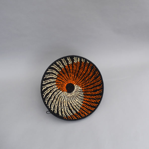 Hand woven straw. A tradition and art which has been part of Ugandan culture for centuries.  With all of the materials used being natural products or recycled, we also believe this is a lovely way of making use of natural resources the world has to offer and making positive changes to become more sustainable.  Beautifully, unique, handmade basket made out of banana stalks and raffia fibres also known as the Ugandan basket.