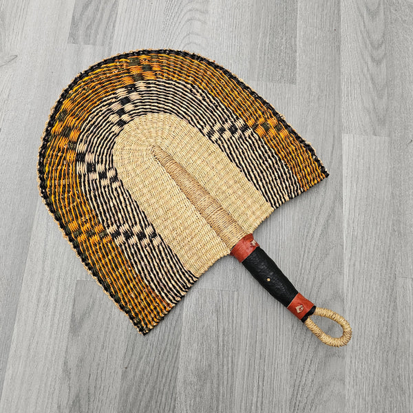 Bolga fan, orange and black straw fan