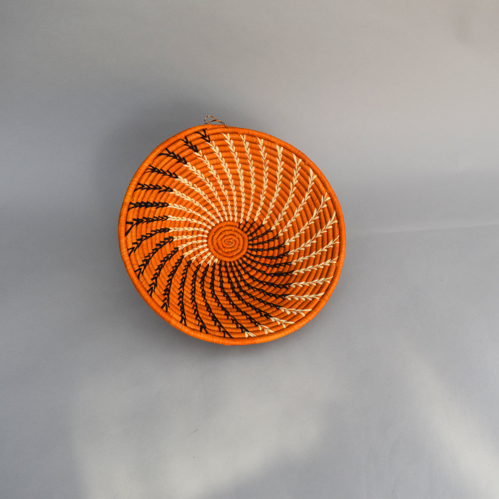 Hand woven straw. A tradition and art which has been part of Ugandan culture for centuries.  With all of the materials used being natural products or recycled, we also believe this is a lovely way of making use of natural resources the world has to offer and making positive changes to become more sustainable.  Beautifully, unique, handmade basket made out of banana stalks and raffia fibres also known as the Ugandan basket. 