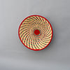 Hand woven straw. A tradition and art which has been part of Ugandan culture for centuries.  With all of the materials used being natural products or recycled, we also believe this is a lovely way of making use of natural resources the world has to offer and making positive changes to become more sustainable.  Beautifully, unique, handmade basket made out of banana stalks and raffia fibres also known as the Ugandan basket. 