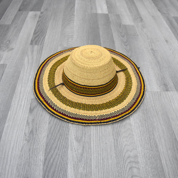 Bolga straw hat Look chic in the summer while protecting yourself from the UV rays. Whether it is to the beach, a day out, or for a party. This woven heart made from elephant grass is durable, Sustainable, and large enough to shield you from the sun.