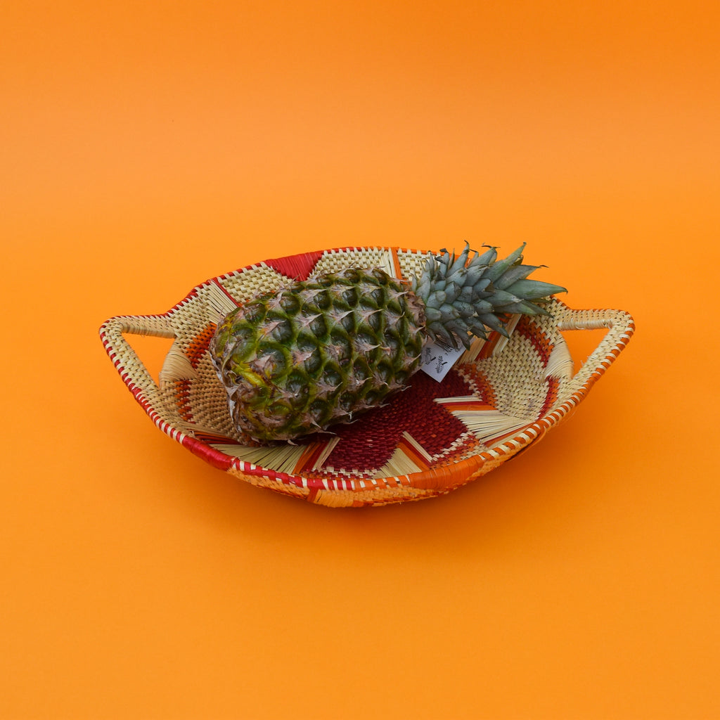  This carefully hand-woven fruit baskets is made of Elephant straw. No basket is the same, each piece has been handcrafted in Bolga, Ghana. There may be some imperfections but that is due to the fact that they are handmade.  Not only is it straw basket or bowl great for storing your fruit and vegetables, It can be used for quiet a number of things including storing bits & bobs and decorating. A stylish way to keep clutter away in the house.  It is 100% eco-friendly and practical and versatile.